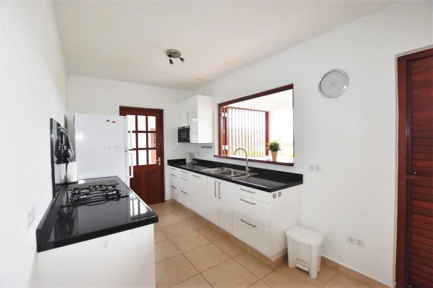 Spacious 3-bedroom apartment for rent with pool and large garage.