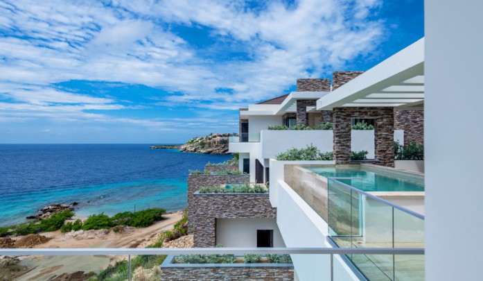 Luxe nieuwe appartementen met zwembad op privé strand in Curacao