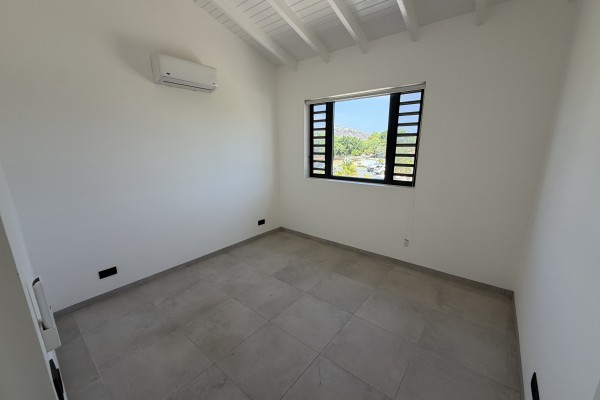 Blue Bay Resort | Modern unfurnished apartment in a green setting