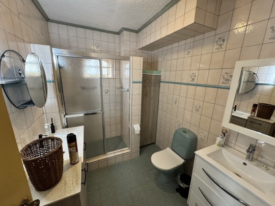 Spacious 4-Bedroom Home with Rooftop Terrace and Garden
