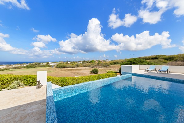Luxury Blue Bay villa with sea view, pool & guest apartment