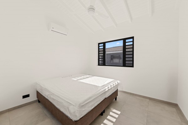 Blue Bay | Move-in ready new-build apartment with garden and pool view