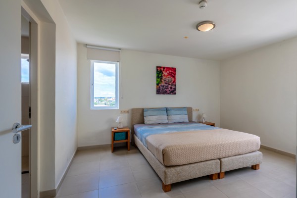 Triple Tree 29 – Unique 2-bedroom corner apartment with ocean view