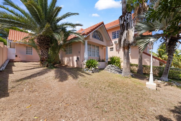 Stately villa with island views, guest accommodation & tropical garden