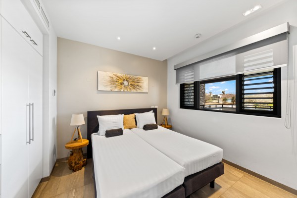 The Shore 6 - Appartement aan Zee op Blue Bay Beach