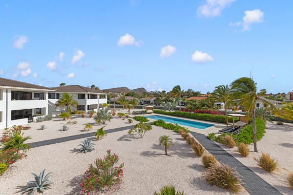 Blue Bay | Move-in ready new-build apartment with garden and pool view