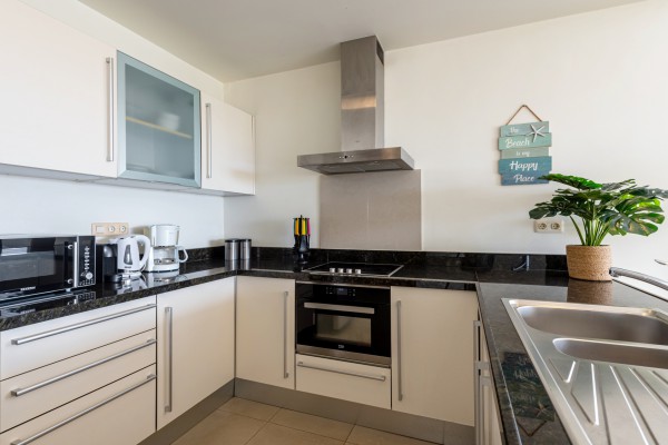 Triple Tree 29 – Unique 2-bedroom corner apartment with ocean view