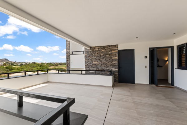 The Shore 6 - Appartement aan Zee op Blue Bay Beach