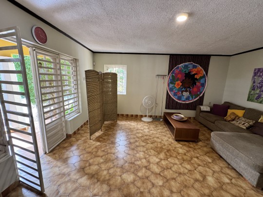 Spacious 4-Bedroom Home with Rooftop Terrace and Garden