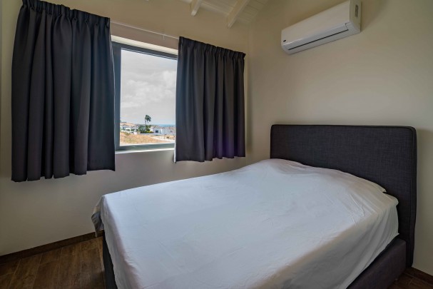 Exclusief topfloor appartement met zeezicht in Blue Bay