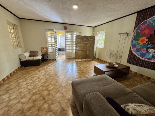 Spacious 4-Bedroom Home with Rooftop Terrace and Garden
