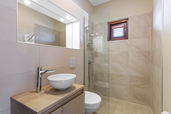 Blue Bay - Luxury, tropical home with pool and golf course views
