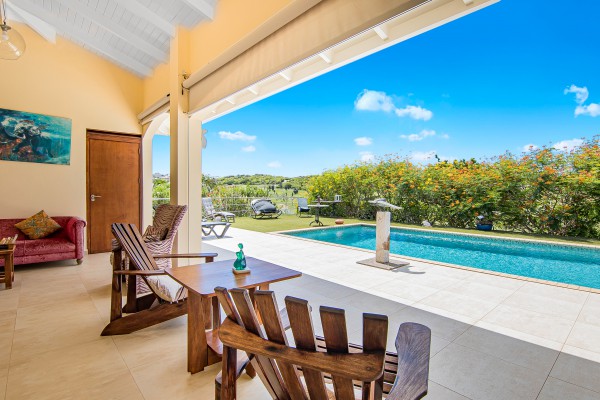 Blue Bay - Luxury, tropical home with pool and golf course views