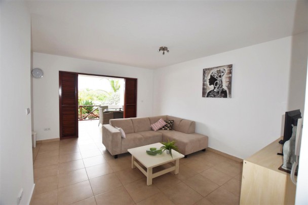Spacious 2-bedroom apartment for rent with pool and large garage.