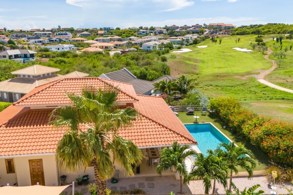 Blue Bay - Luxury, tropical home with pool and golf course views