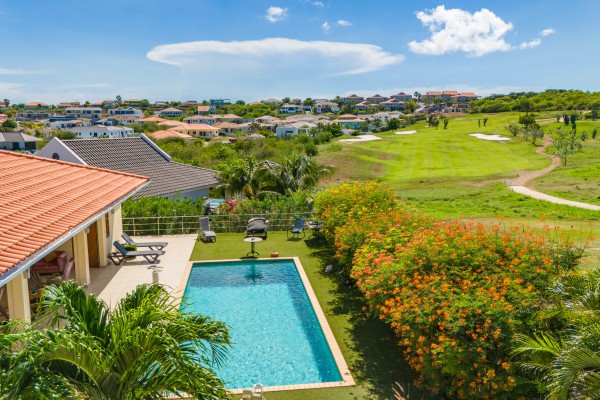 Blue Bay - Luxury, tropical home with pool and golf course views