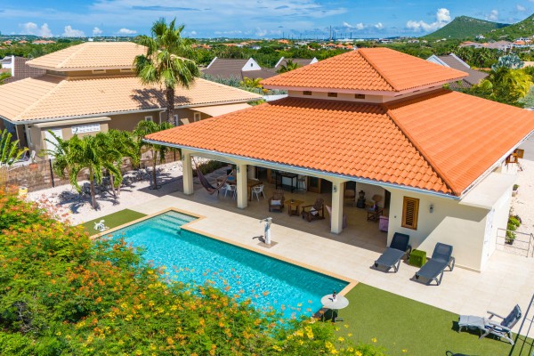 Blue Bay - Luxury, tropical home with pool and golf course views