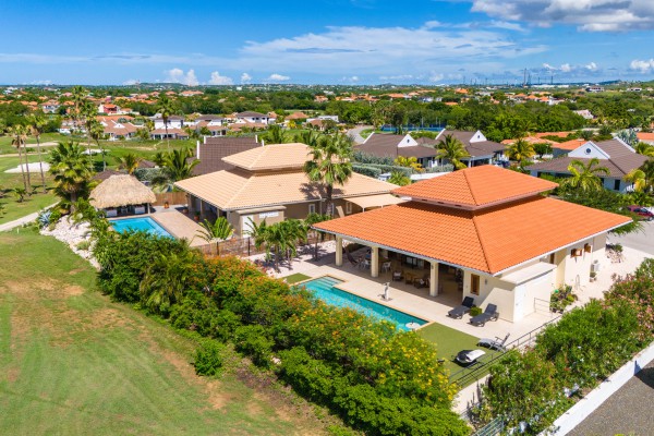 Blue Bay - Luxury, tropical home with pool and golf course views