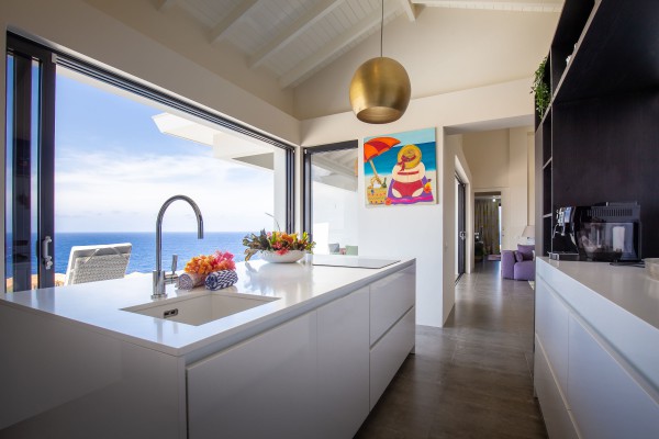 Prachtige woning met uitzicht over de oceaan en binnenmeer op resort