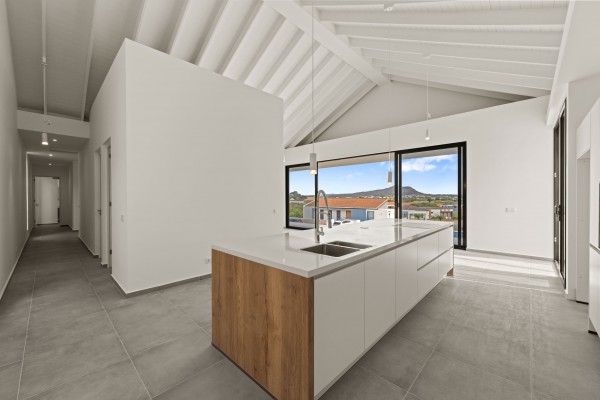 Blue Bay - Modern nieuwbouw huis met zwembad op Golf Resort met strand