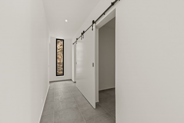 Blue Bay - Modern nieuwbouw huis met zwembad op Golf Resort met strand