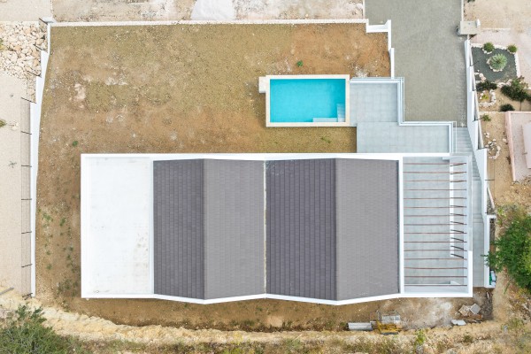 Blue Bay - Modern nieuwbouw huis met zwembad op Golf Resort met strand