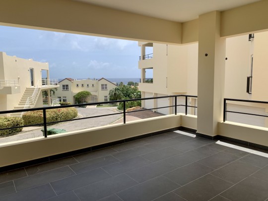 Royal Palm Resort - Modern apartment with sea view and private garage