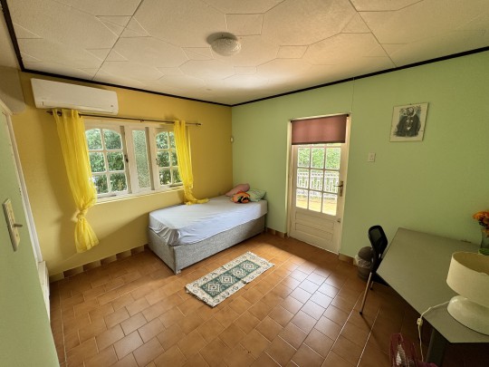 Spacious 4-Bedroom Home with Rooftop Terrace and Garden