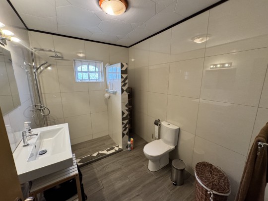 Spacious 4-Bedroom Home with Rooftop Terrace and Garden